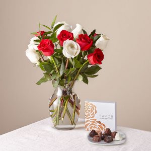 Photo of Nutcracker Rose Bouquet and Assorted Chocolates Bundle